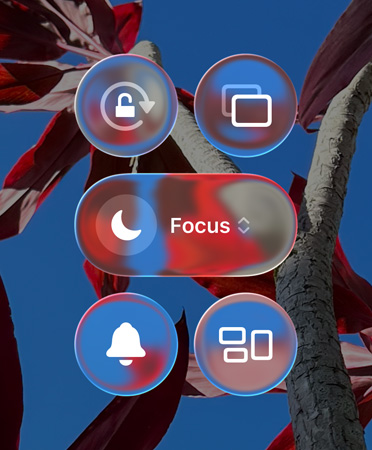 Colourful iPhone Home Screen showing transparent Liquid Glass apps and widgets