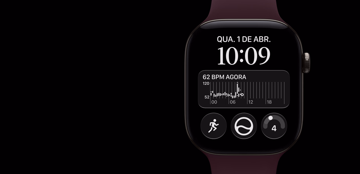 Apple Watch Series 12 com caixa preta de alumínio e pulseira esportiva bordô. O app Batimentos mostra os batimentos por minuto em um coração vermelho e um gráfico abaixo. Na lateral direita externa, está a Digital Crown