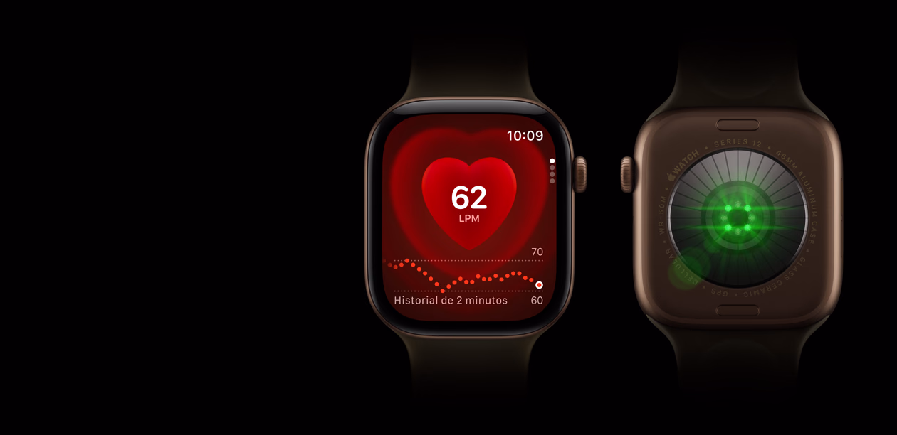 Dos dispositivos Apple Watch Series 12, caja de aluminio, color bronce oscuro con correa deportiva color oliva, uno con la app Frecuencia Cardiaca, el otro muestra el sistema de registro de datos de salud en la parte posterior del reloj, con luces LED verdes y brillantes