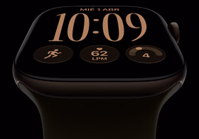 Apple Watch Series 12, caja de aluminio, color bronce oscuro, carátula Modular, complicaciones: día y fecha, Entrenamientos, círculos de Actividad, Apple Music, parte lateral derecha, Digital Crown, correa deportiva, color oliva