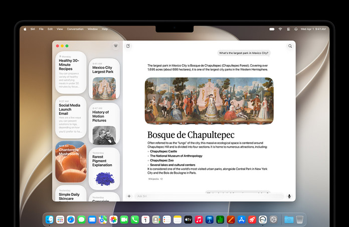 Un MacBook Pro 14 pouces noir sidéral affiche l’app Siri avec une conversation active et les conversations précédentes dans la barre latérale.