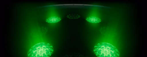 Underside of watch with multiple round sensors with glowing green LED lights