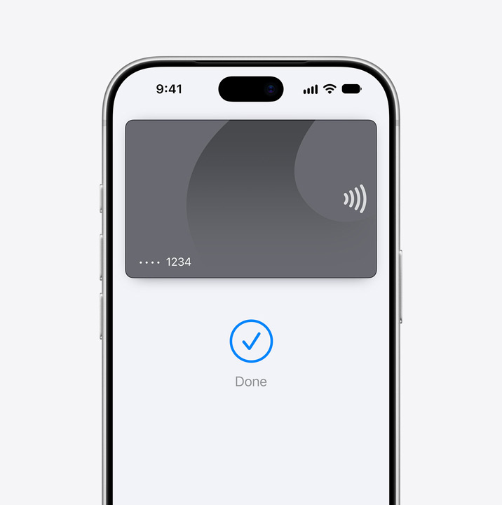 Partial iPhone screen display, showing a credit card being used in Apple Pay