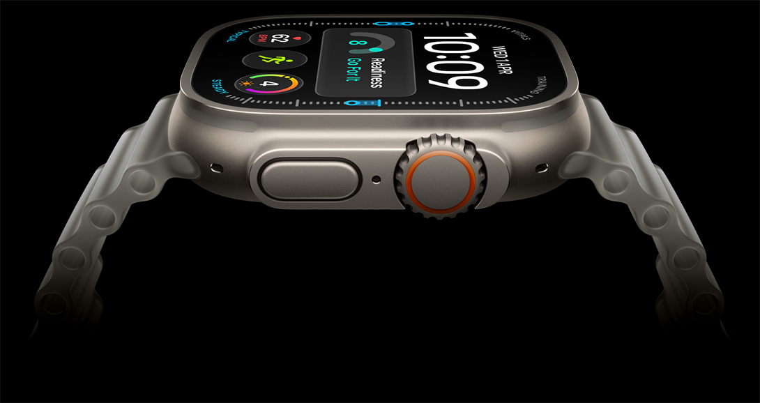 Apple Watch Ultra 4, titanium case, silver color; screen shows digital time display, health and fitness metrics