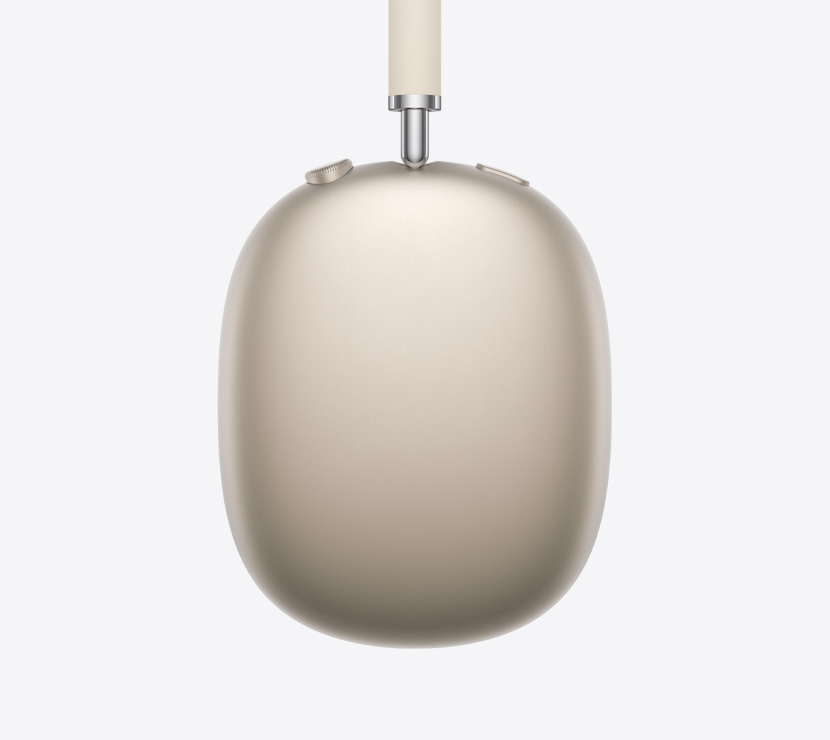 AirPods Max 2 koptelefoon, zijkant, in de kleur sterrenlicht, detail van uitschuifbare arm, oorkussen, Digital Crown en knop voor geluidsbeheersing