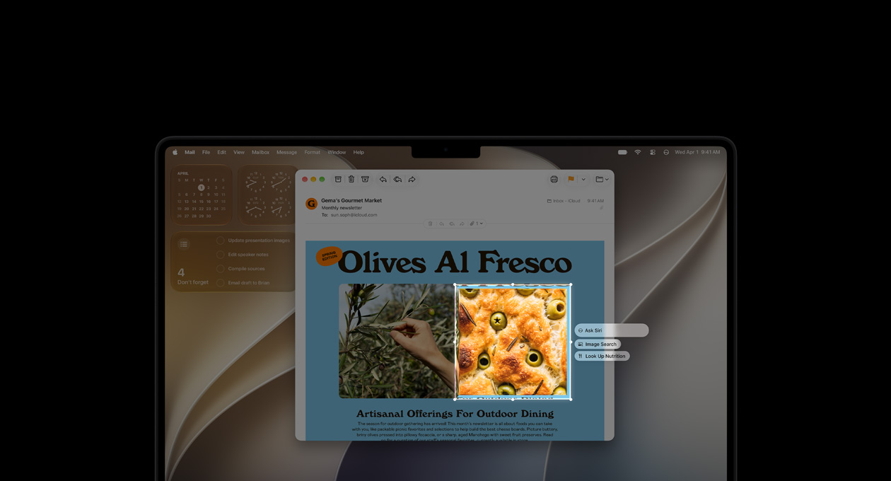 14 inç MacBook Pro, Uzay Siyahı, ekranda bir Görsel Zeka demosu sergileniyor, yiyecek ve ot görselleri içeren bir mail gösteriliyor, ekmek içindeki zeytin görseli ana hatlarıyla bir kutu içine alınıyor ve görselin üzerinde Ask Siri, Image Search ve Look Up Nutrition seçeneklerinden oluşan üç istem beliriyor