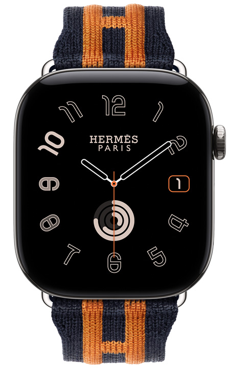 Apple Watch Hermès Series 12，銀色鈦金屬錶殼，展示 Radial 指針錶面 (時針、分針和秒針，複雜功能：日期、健身記錄圓圈)，配搭 Bleu Nuit/Orange 夜藍色配橙色 Rocabar Club 錶帶，採用深藍色織造物料，運用橙色凸起的條紋設計，以呈現出 Hermès H 標誌；機身右側有數碼錶冠和凸起的側邊按鈕
