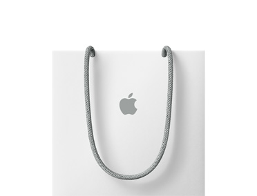حقيبة Apple لون أبيض، حمالتان على شكل حبل لون رمادي، شعار Apple في الوسط لون رمادي