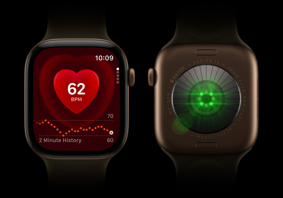 Two Apple Watch Series 12 devices side by side, showing the back crystal with bright green sensor lights and the front display with a heart rate monitor.